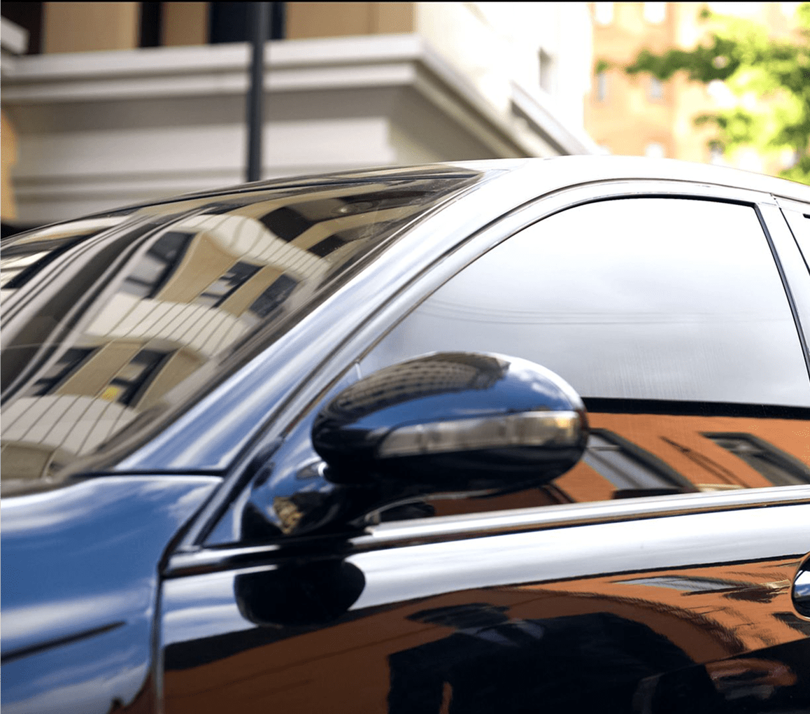 Sleek black car with tinted windows